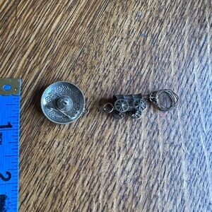 Three vintage Sterling silver western themed charms, send offers